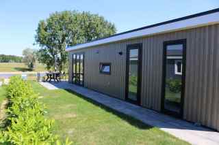 5 persons holiday home with view over the IJssel on recreation park Rh...