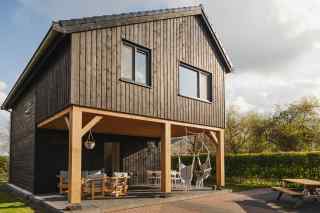 Luxury 6 person vacation home next to a vineyard in Ruinerwold, Drenth...