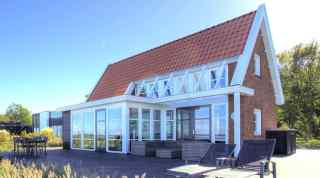 6 persoons vakantiehuis aan het natuurmeer op vakantiepark Bad Hoophui...