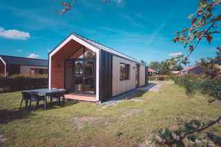 Luxurious 16 person group log cabin with 4 tiny houses near Lemmer