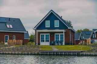 Modern water villa for 8 persons with spacious garden on Holiday park...