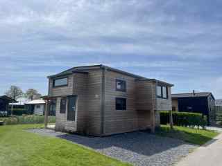 Cozy 4 person Tiny House on beautiful vacation park in North Holland.