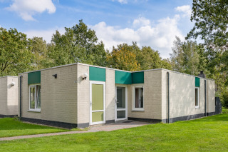 Cosy 10-person holiday home at nice holiday park Huznedal with recreat...