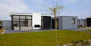 6 person holiday home with bright lights on a holiday park in Bresken