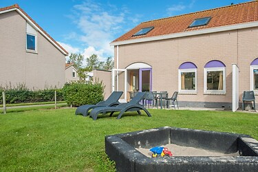Child friendly 6 person holiday home in holidaypark in Renesse 100m fr...