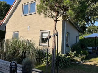 Luxe 6 persoons vakantiehuis met omheinde tuin in Ouddorp vlakbij het...