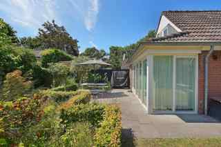 4-Personen-Ferienhaus mit grünem, eingezäunten Garten in Ouddorp