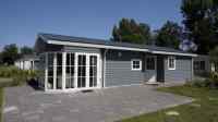 4 persons chalet on holiday park Buitenhuizen with outdoor swimming po...