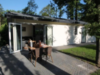 Luxury bungalow for 4 persons located on a holiday park in the woods n...