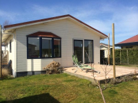 Large 6-person holiday home directly by the water on De Krabbenkreek i...