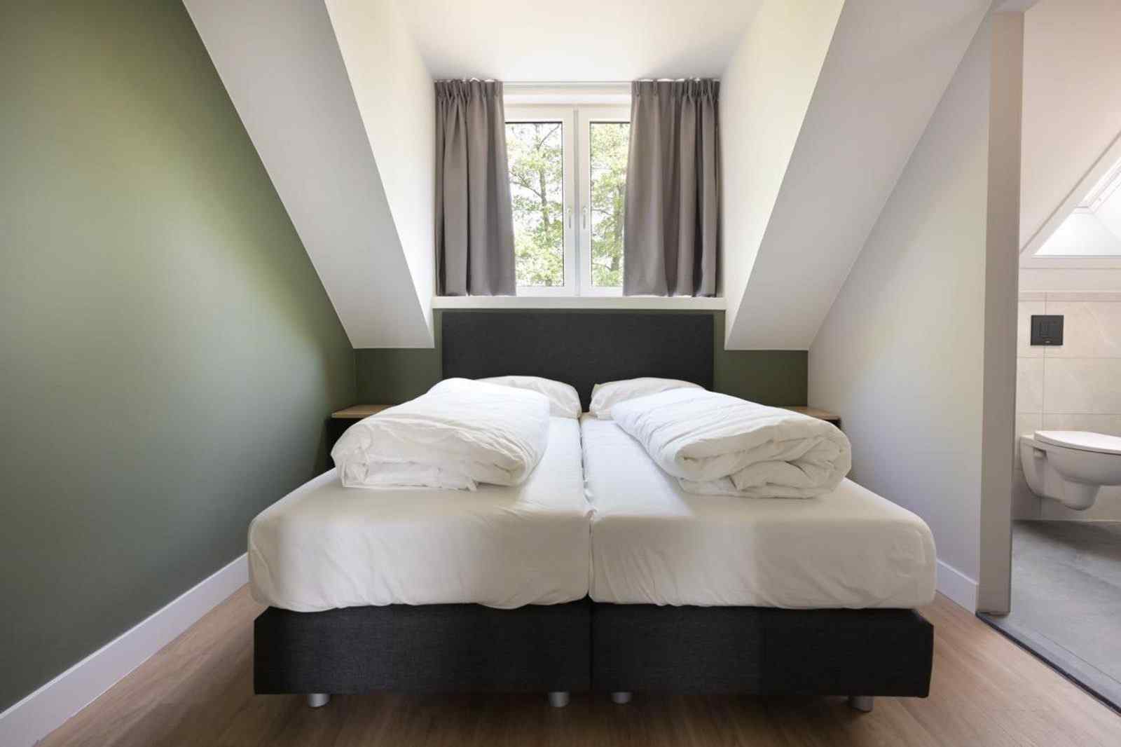 luxe-6-persoons-welness-vakantiewoning-met-hottub-en-sauna-op-de-veluwe