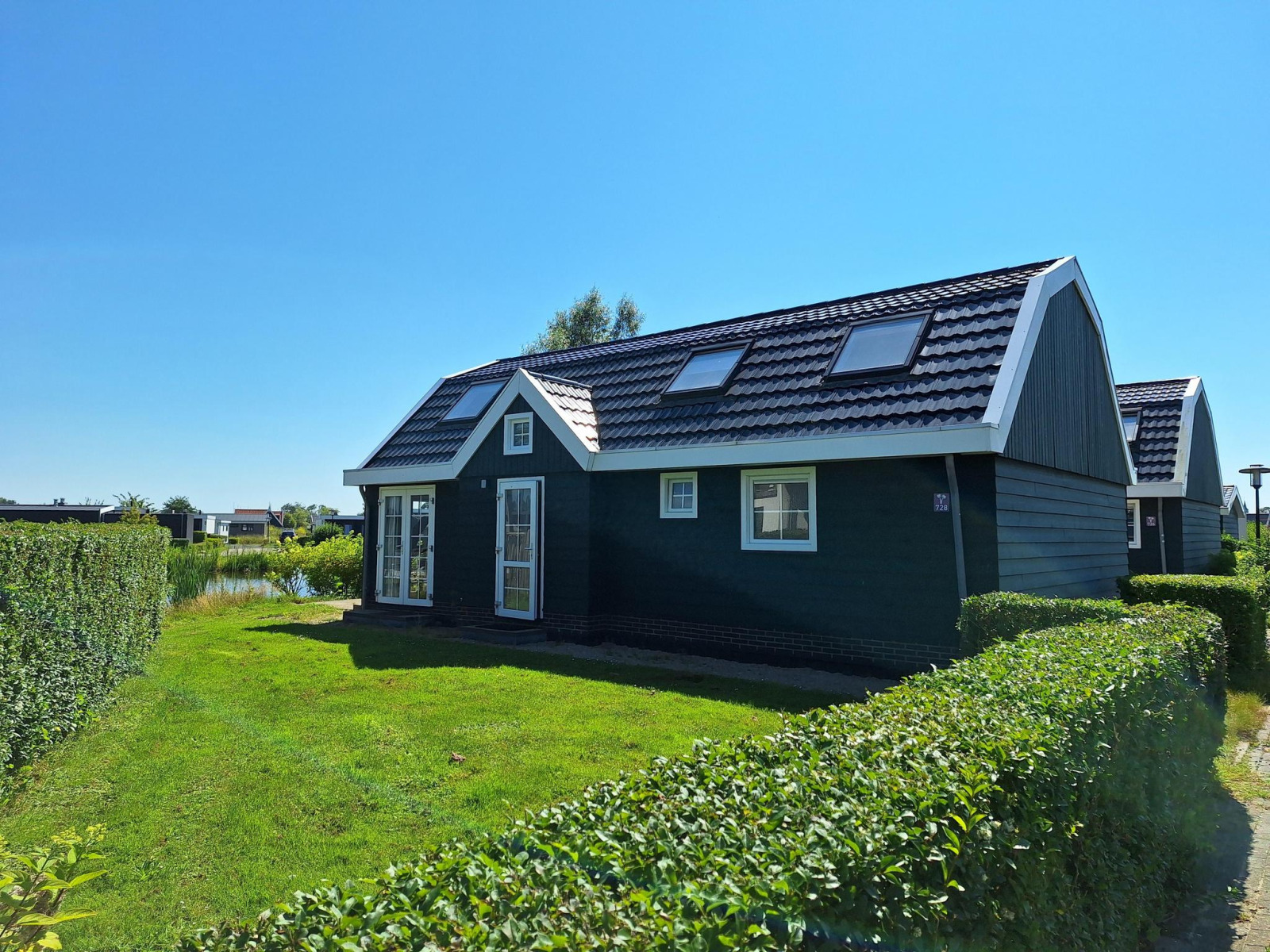 Comfortabele 10-persoons vakantiewoning met grote tuin op een Noord-Hollands vakantiepark — groepsaccommodatie in Noord-Holland