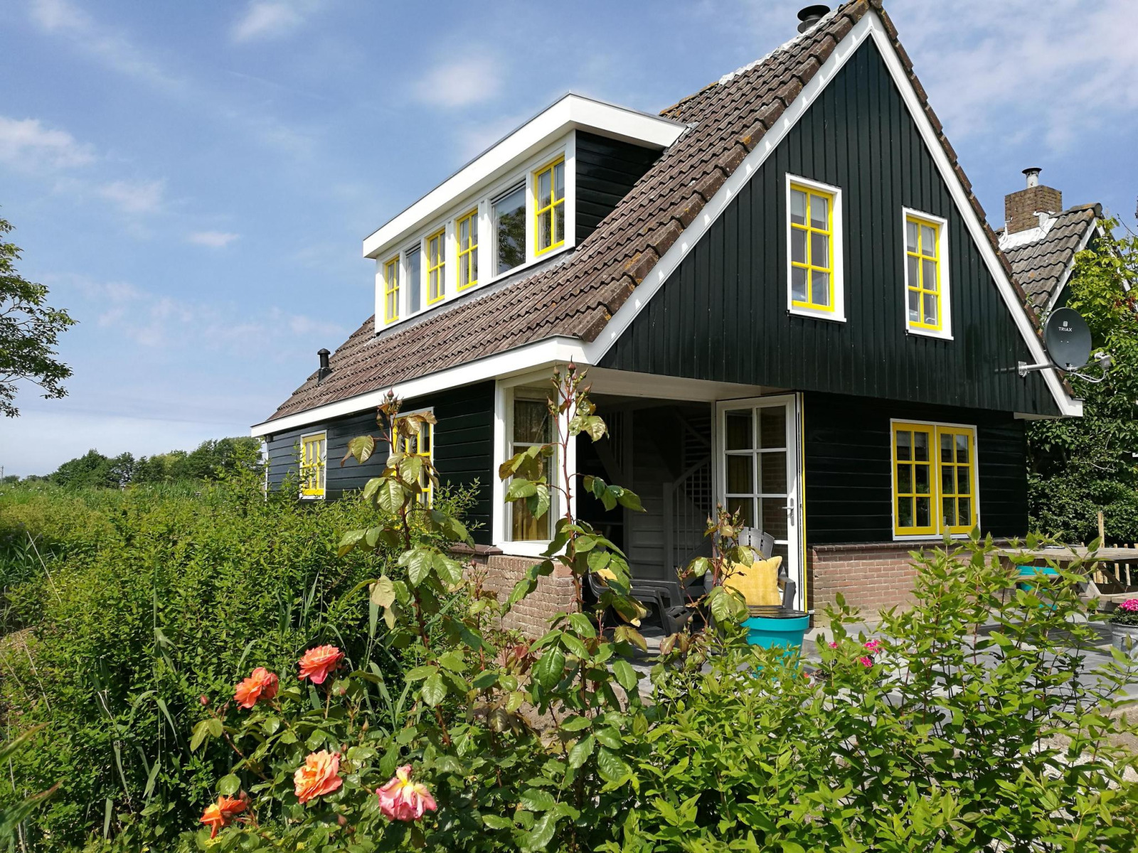 Comfortabel 10-persoons vakantiehuis met steiger en omheinde tuin nabij Callantsoog — groepsaccommodatie met zwembad