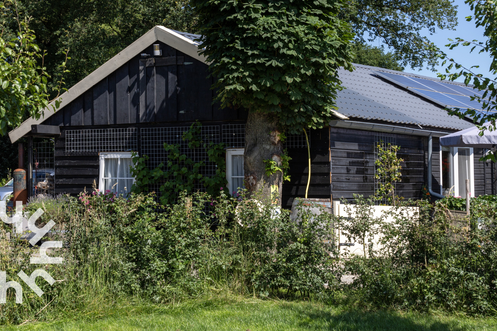 sfeervol-4-persoons-appartement-met-een-hottub-in-de-tuin-in-nieuw-heeten