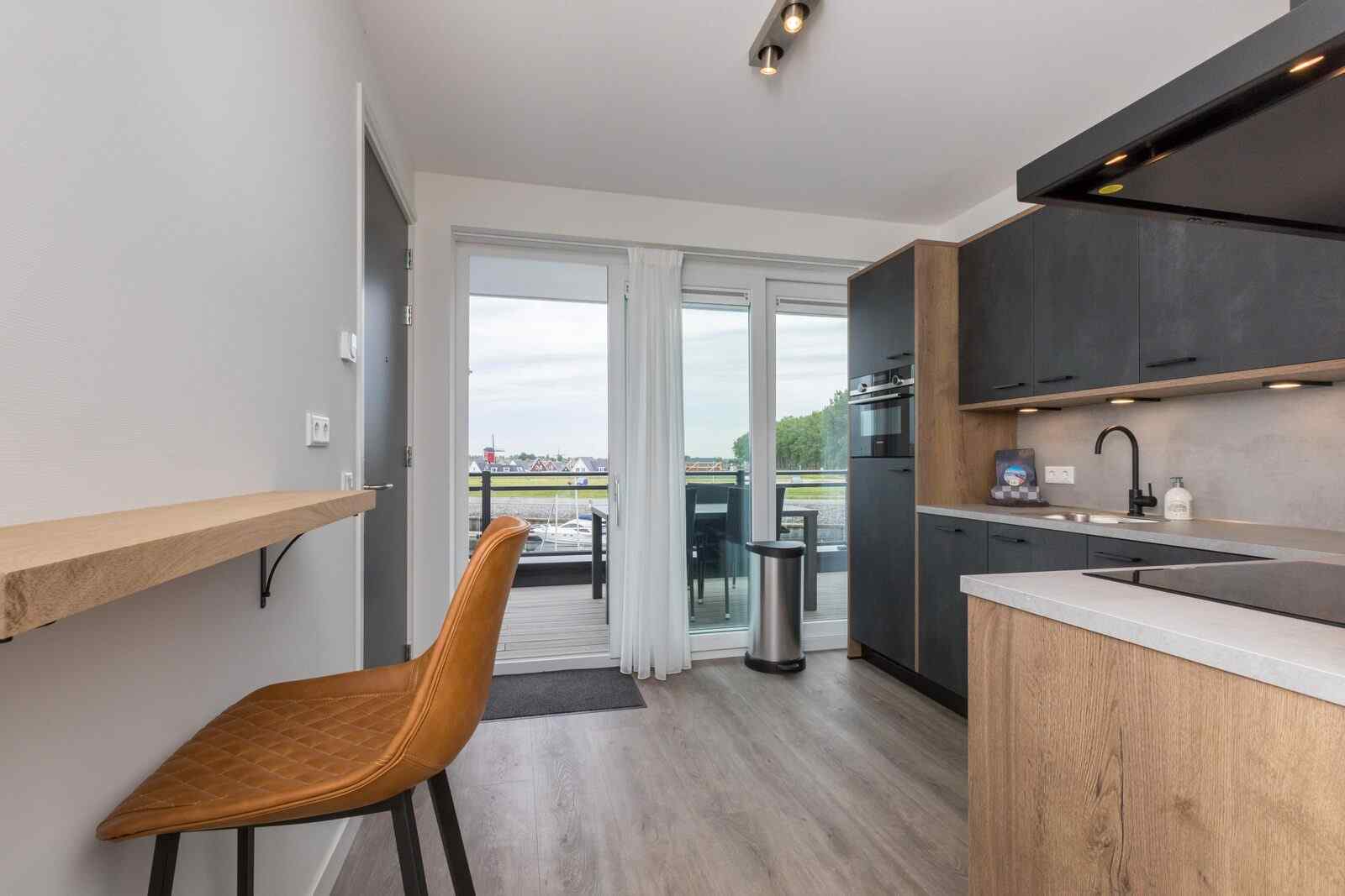 4-persoons-appartement-met-een-weids-uitzicht-over-het-water-in-sint-annaland